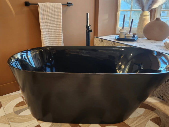 free standing black bathtub